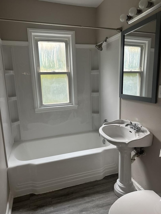 490 Country Club Dr, Kankakee, IL 60901 - bathroom featuring bathtub / shower combination, wood finished floors, and healthy amount of natural light