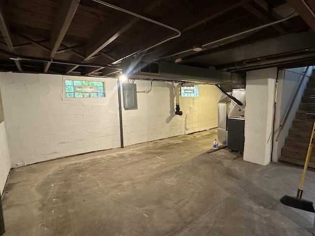 490 Country Club Dr, Kankakee, IL 60901 - below grade area with electric panel, stairs, and heating unit