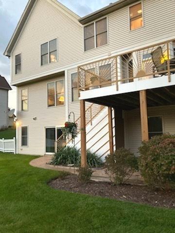 5355 Fox Path Ln, Hoffman Estates, IL 60192 - back of property featuring a lawn and a wooden deck