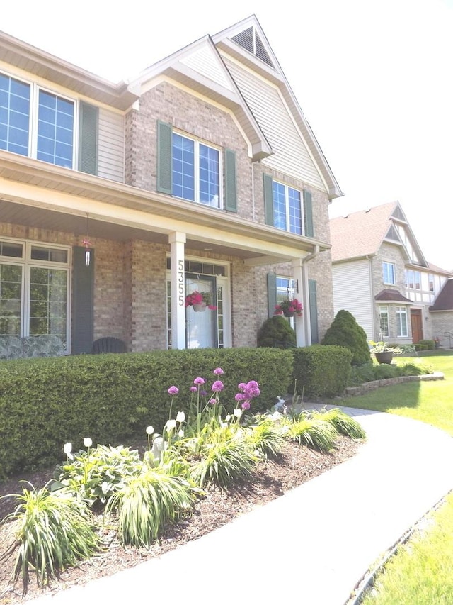 5355 Fox Path Ln, Hoffman Estates, IL 60192 - view of front of home with brick siding and covered porch