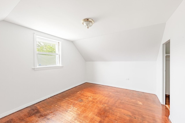 4640 S Winchester Ave, Chicago, IL 60609 - bonus room with vaulted ceiling, wood-type flooring, and baseboards