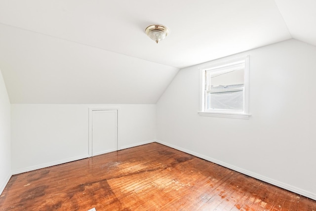 4640 S Winchester Ave, Chicago, IL 60609 - bonus room with lofted ceiling, hardwood / wood-style flooring, and baseboards