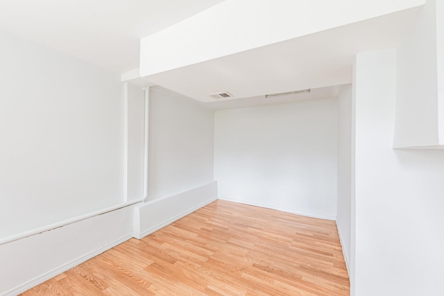 4640 S Winchester Ave, Chicago, IL 60609 - unfurnished room featuring light wood-type flooring and baseboards