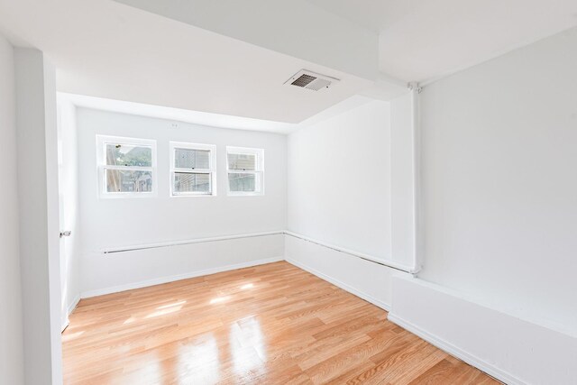 4640 S Winchester Ave, Chicago, IL 60609 - unfurnished room with light wood finished floors and baseboards