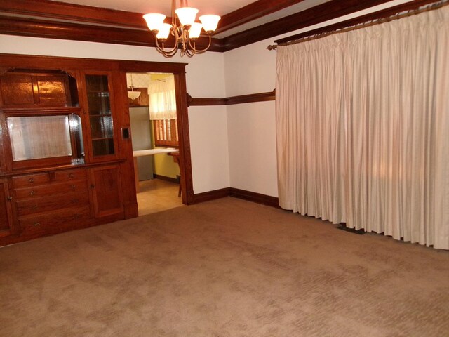 1425 Peoria St, Peru, IL 61354 - carpeted spare room with a chandelier