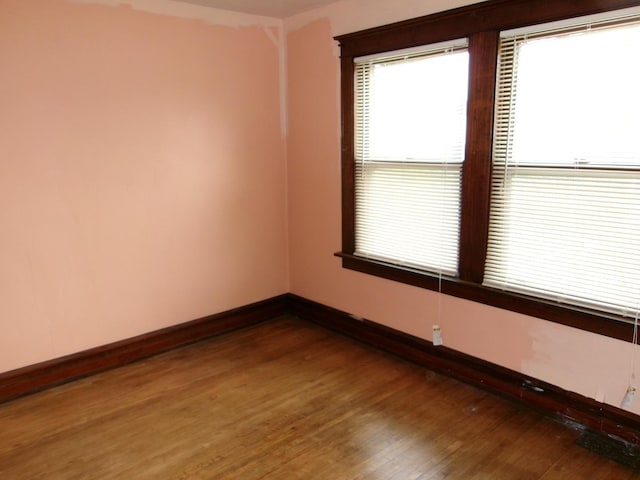 1425 Peoria St, Peru, IL 61354 - unfurnished room with plenty of natural light, baseboards, and wood finished floors
