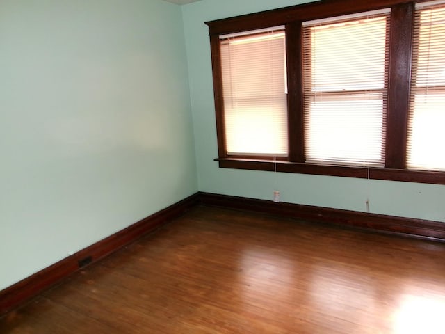 1425 Peoria St, Peru, IL 61354 - unfurnished room featuring dark wood finished floors and baseboards