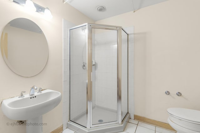 2471 Glen Eagles Dr, Olympia Fields, IL 60461 - full bathroom with a shower stall, toilet, tile patterned floors, baseboards, and a sink