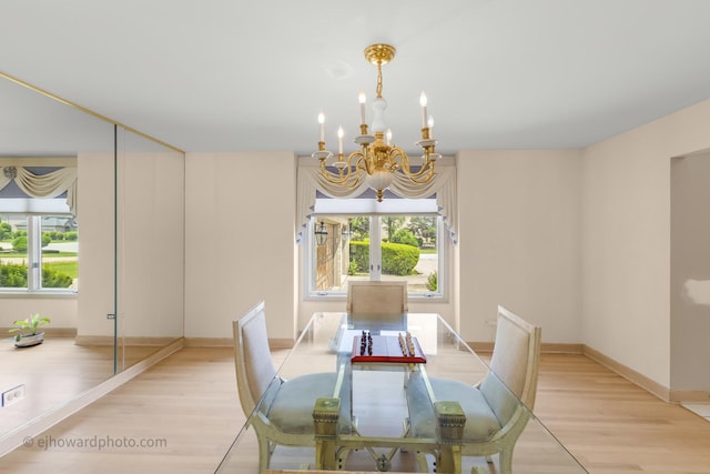 2471 Glen Eagles Dr, Olympia Fields, IL 60461 - dining area with a chandelier, light wood-type flooring, and baseboards
