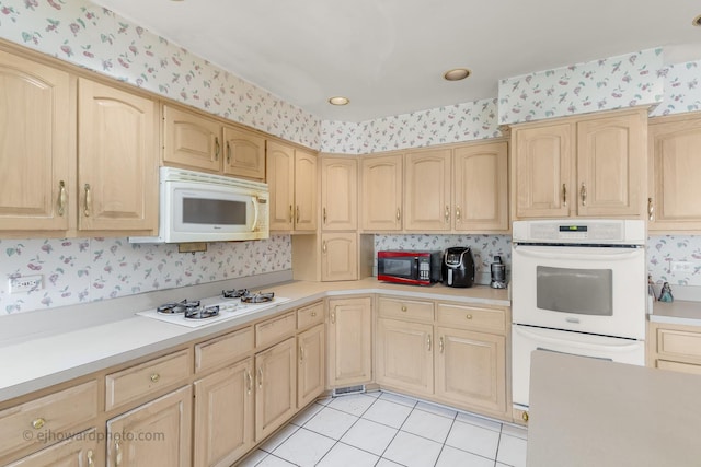 2471 Glen Eagles Dr, Olympia Fields, IL 60461 - kitchen with white appliances, wallpapered walls, light brown cabinetry, and light countertops