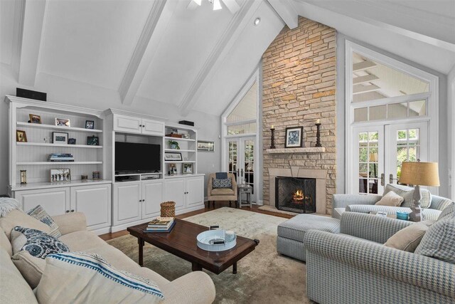 1135 Lawrence Ave, Lake Forest, IL 60045 - living area featuring french doors, beam ceiling, high vaulted ceiling, and a fireplace