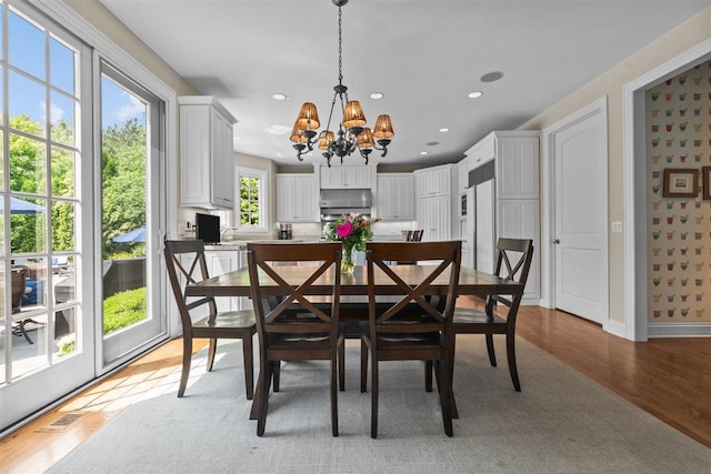 1135 Lawrence Ave, Lake Forest, IL 60045 - dining space with a chandelier, light wood-style flooring, and recessed lighting