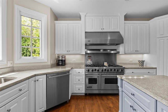 1135 Lawrence Ave, Lake Forest, IL 60045 - kitchen with appliances with stainless steel finishes, range hood, and white cabinets
