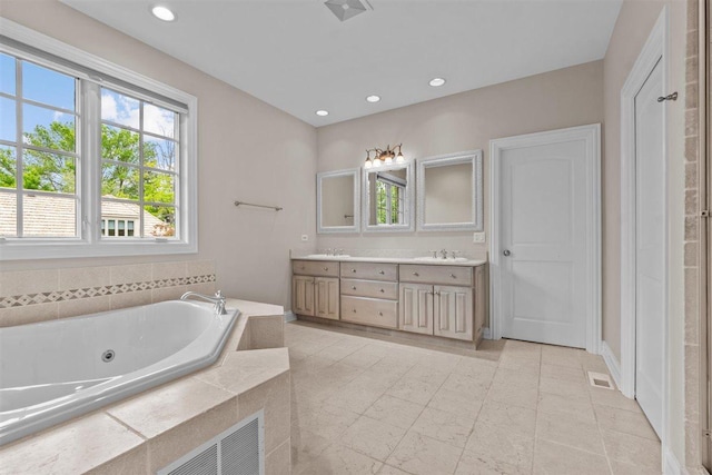 1135 Lawrence Ave, Lake Forest, IL 60045 - full bathroom with double vanity, a whirlpool tub, and recessed lighting
