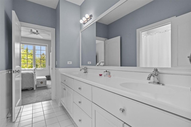 1135 Lawrence Ave, Lake Forest, IL 60045 - ensuite bathroom with double vanity, tile patterned flooring, and a ceiling fan