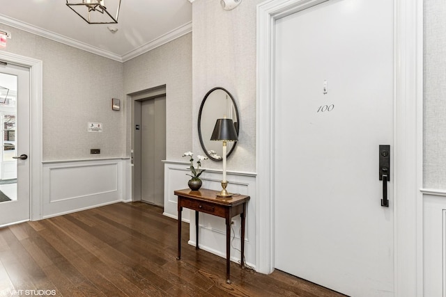 727 N Mckinley Rd Unit 100, Lake Forest, IL 60045 - hallway featuring elevator, dark wood-style flooring, crown molding, a wainscoted wall, and a decorative wall