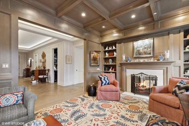 727 N Mckinley Rd Unit 100, Lake Forest, IL 60045 - living area with built in shelves, crown molding, a glass covered fireplace, beam ceiling, and recessed lighting