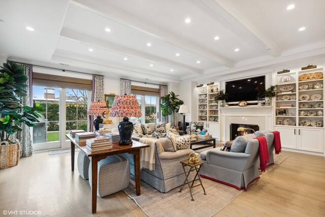 727 N Mckinley Rd Unit 100, Lake Forest, IL 60045 - living room featuring light wood-style flooring, beamed ceiling, a glass covered fireplace, recessed lighting, and built in features