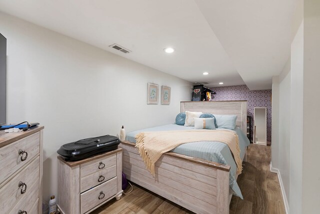 1630 N Avers Ave, Chicago, IL 60647 - bedroom with wallpapered walls, light wood-style flooring, recessed lighting, and baseboards