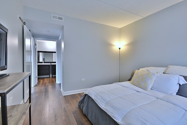 210 N Addison Ave Unit 201, Elmhurst, IL 60126 - bedroom featuring dark wood-style floors and baseboards