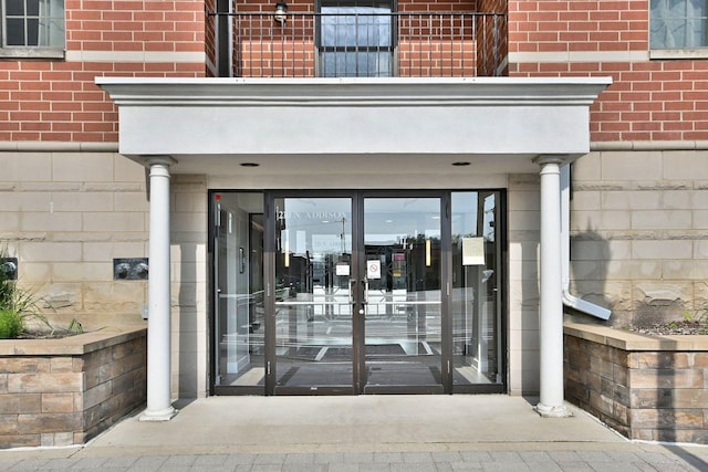 210 N Addison Ave Unit 201, Elmhurst, IL 60126 - entrance to property with brick siding and a balcony