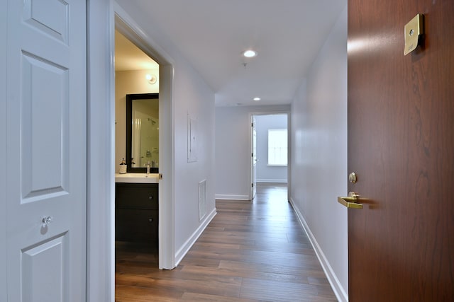 210 N Addison Ave Unit 201, Elmhurst, IL 60126 - corridor with dark wood-type flooring, baseboards, and recessed lighting