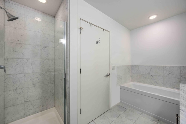 123 S Green St Unit 710B, Chicago, IL 60607 - full bathroom featuring a shower stall, a bath, tile patterned floors, and recessed lighting