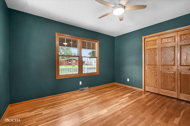 510 W Grant St, Sheridan, IL 60551 - unfurnished bedroom with wood finished floors and a ceiling fan