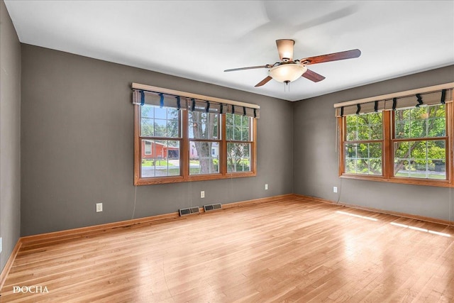 510 W Grant St, Sheridan, IL 60551 - empty room featuring wood finished floors and a ceiling fan