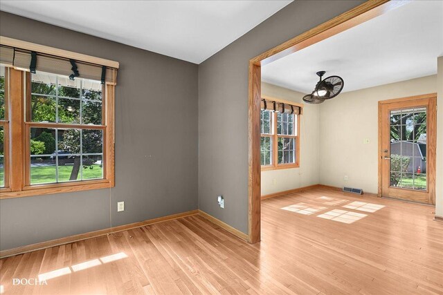 510 W Grant St, Sheridan, IL 60551 - unfurnished room featuring wood finished floors and plenty of natural light