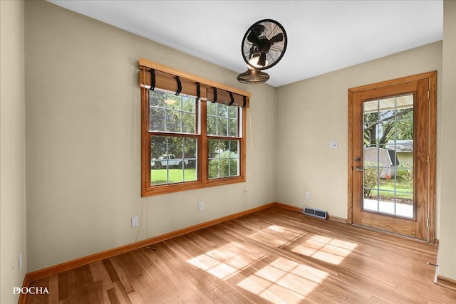 510 W Grant St, Sheridan, IL 60551 - empty room with light wood-style floors