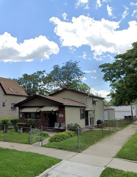 11800 S Peoria St, Chicago, IL 60643 - view of front of house with a gate and brick siding