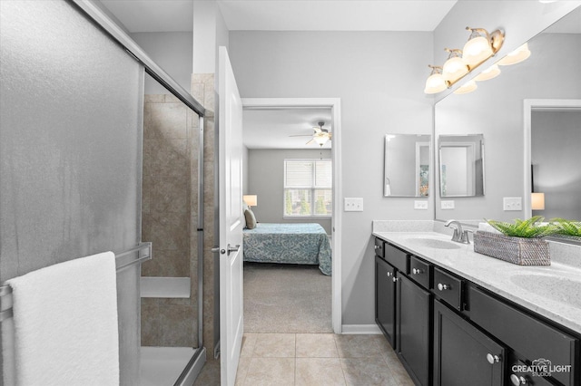 794 Suffield Ct, Oswego, IL 60543 - bathroom with double vanity, connected bathroom, tile patterned floors, a stall shower, and ceiling fan