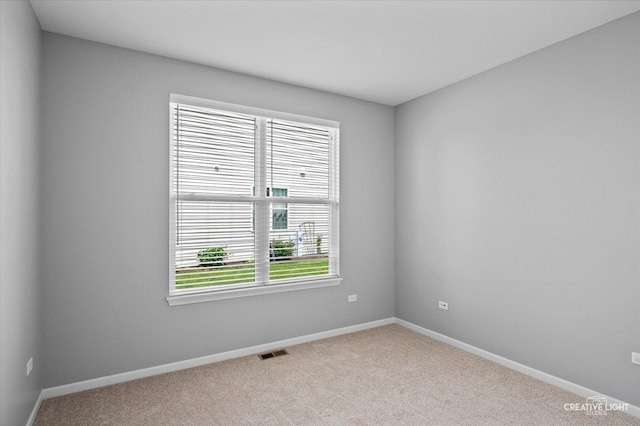 794 Suffield Ct, Oswego, IL 60543 - carpeted empty room with baseboards