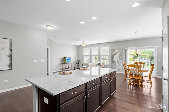 794 Suffield Ct, Oswego, IL 60543 - kitchen with dark wood finished floors, healthy amount of natural light, recessed lighting, hanging light fixtures, and a ceiling fan
