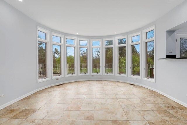 309 Dundee Rd, Barrington, IL 60010 - unfurnished sunroom featuring recessed lighting, baseboards, and tile patterned floors