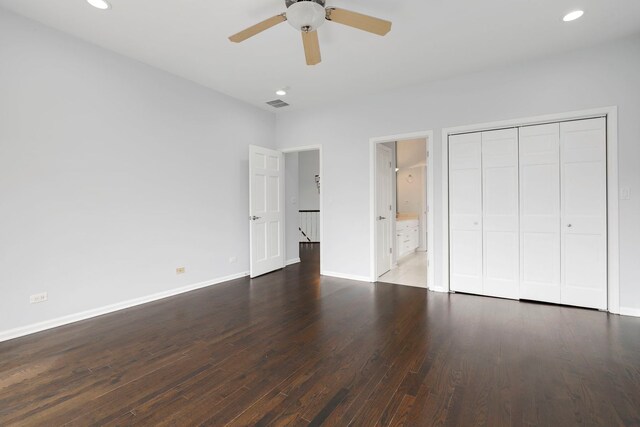309 Dundee Rd, Barrington, IL 60010 - unfurnished bedroom featuring wood finished floors, baseboards, recessed lighting, ensuite bathroom, and a closet