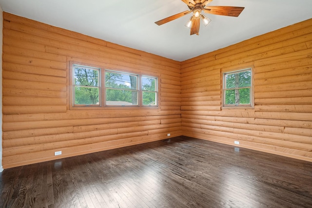 189 E 34th St, Steger, IL 60475 - unfurnished room featuring a ceiling fan, dark wood-style flooring, and rustic walls
