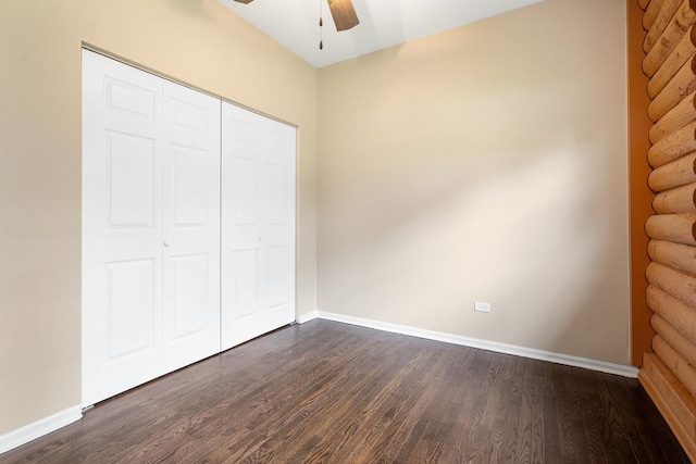 189 E 34th St, Steger, IL 60475 - unfurnished bedroom featuring dark wood-style flooring, a closet, and a ceiling fan