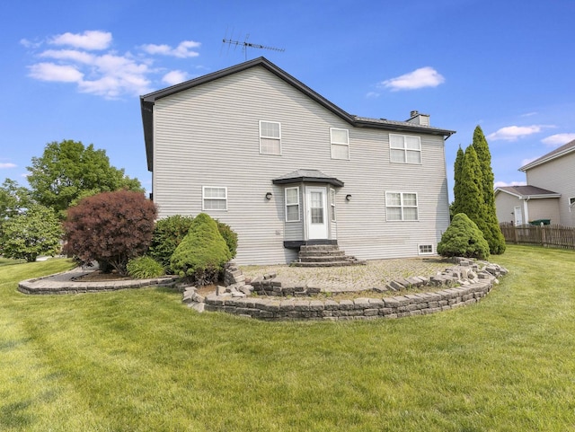 961 Ontario Dr, Romeoville, IL 60446 - rear view of property with a chimney and entry steps