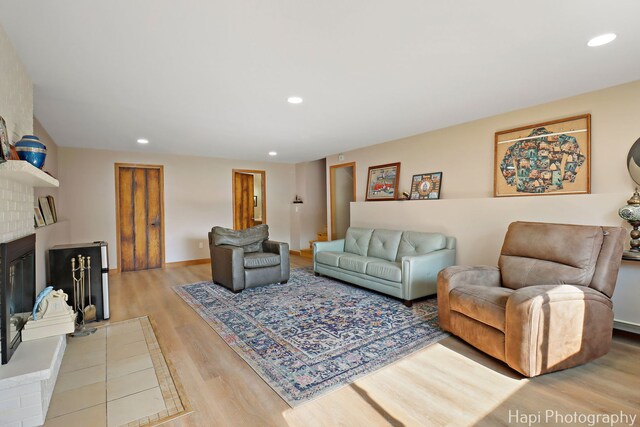 6312 Londonderry Dr, Cary, IL 60013 - living area featuring wood finished floors, recessed lighting, a fireplace, and baseboards