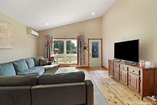 6312 Londonderry Dr, Cary, IL 60013 - living area featuring light wood finished floors, lofted ceiling, an AC wall unit, recessed lighting, and baseboards
