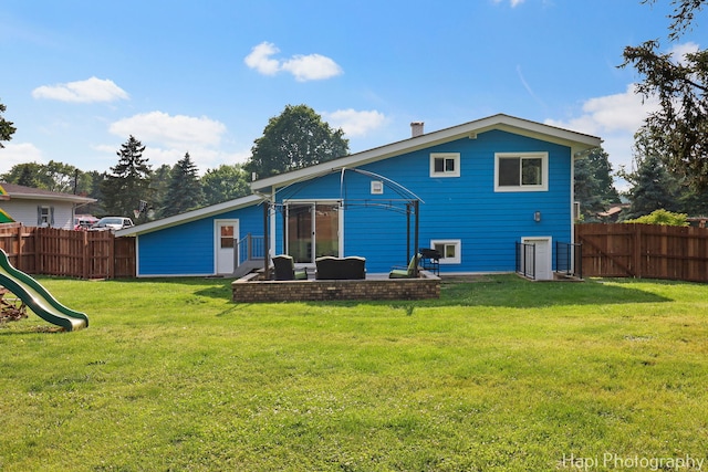 6312 Londonderry Dr, Cary, IL 60013 - rear view of house with a playground