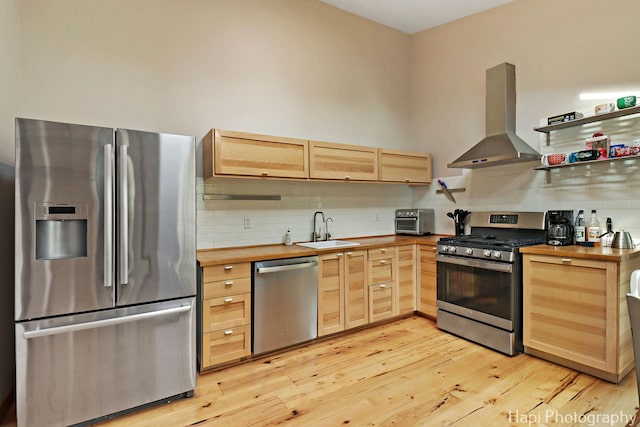 6312 Londonderry Dr, Cary, IL 60013 - kitchen with stainless steel appliances, wood counters, wall chimney exhaust hood, and a sink