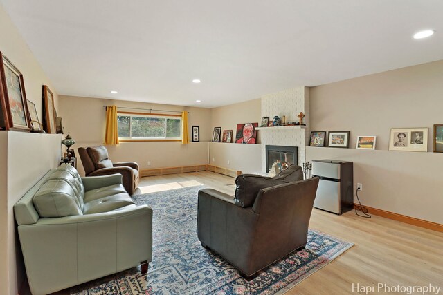 6312 Londonderry Dr, Cary, IL 60013 - living area featuring wood finished floors, baseboards, a fireplace, and recessed lighting
