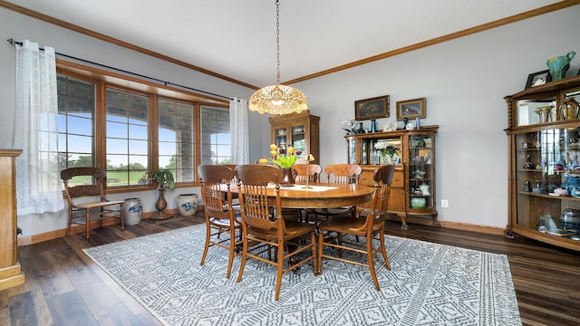 2765 W Pines Rd, Oregon, IL 61061 - dining room featuring crown molding, wood finished floors, and baseboards