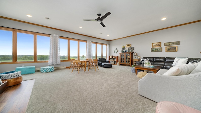 2765 W Pines Rd, Oregon, IL 61061 - living room with ornamental molding, a ceiling fan, recessed lighting, carpet floors, and a baseboard radiator