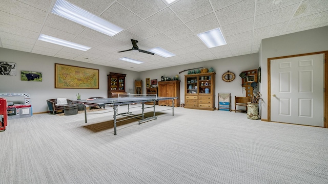 2765 W Pines Rd, Oregon, IL 61061 - rec room featuring ceiling fan, carpet floors, a paneled ceiling, and baseboards