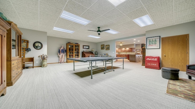 2765 W Pines Rd, Oregon, IL 61061 - playroom featuring carpet floors, baseboards, a ceiling fan, and a drop ceiling