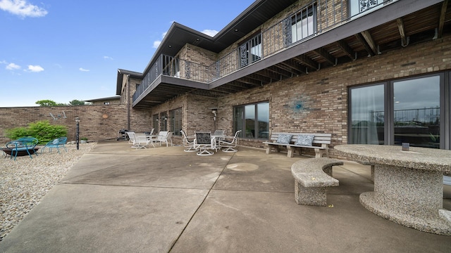2765 W Pines Rd, Oregon, IL 61061 - view of patio / terrace featuring a balcony and outdoor dining space